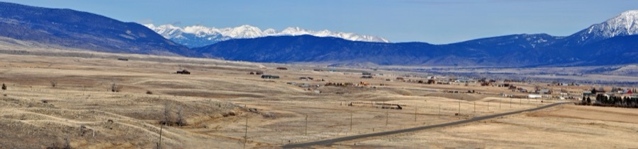 Sample photo: the Crazy Mountains above Paradise Valley, Montana, with homes on the valley floor